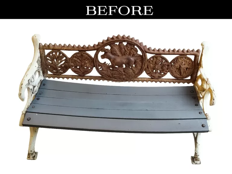 Old decorative outdoor bench with faded paint and rusted metal detailing before restoration